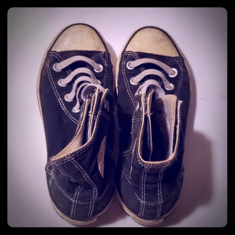 Well loved converse high top sneaker